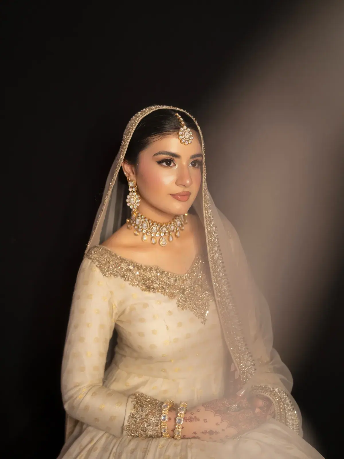 Ivory bridal makeup with a sheer dupatta at House of Salons Civic Centre (Ladies), Civic Centre, Bahria Town Phase 4, Rawalpindi