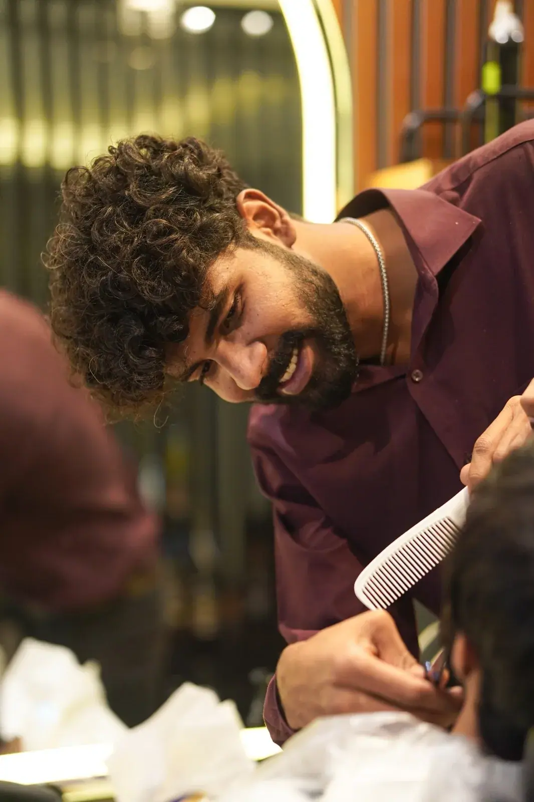 Barber styling natural curls at House of Salons F-11 (Gents), F-11 Markaz, Islamabad