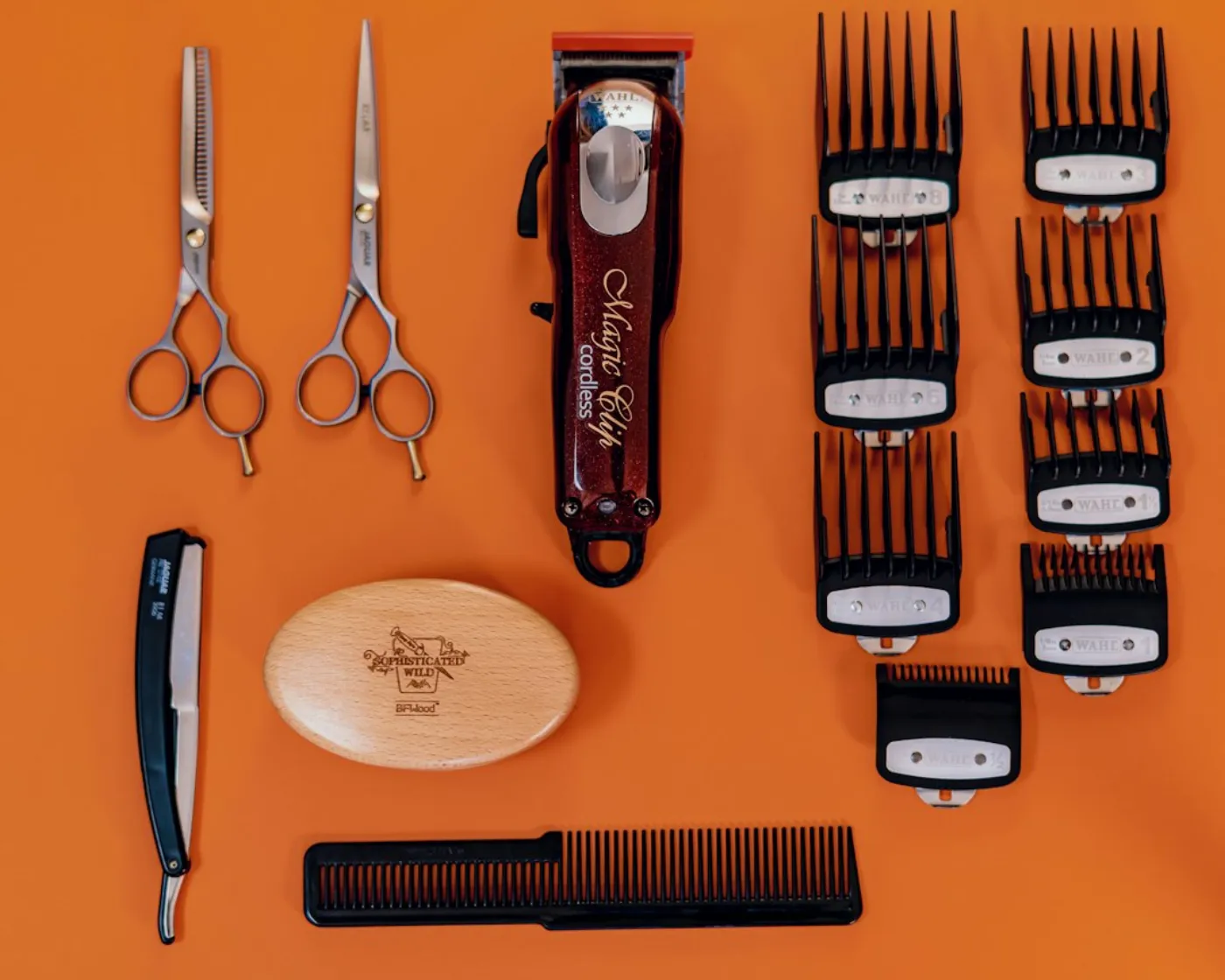 Close up shot of professional hair styling tools and accessories on a salon station