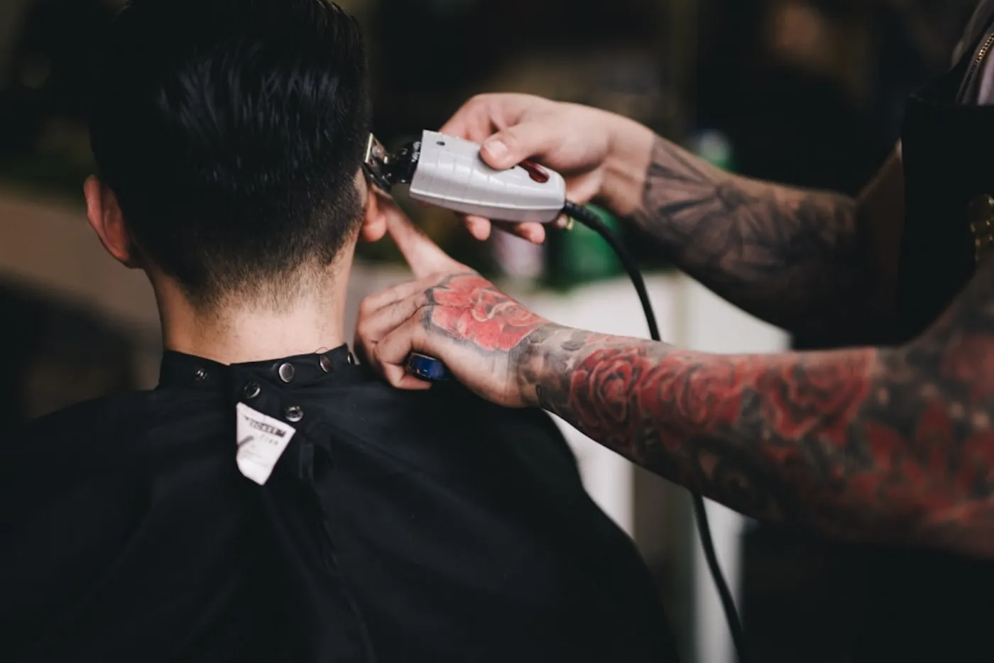 A close-up of a perfectly executed men's fade haircut.