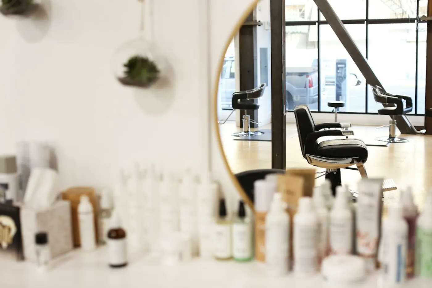 Stylist applying vibrant toner to client hair