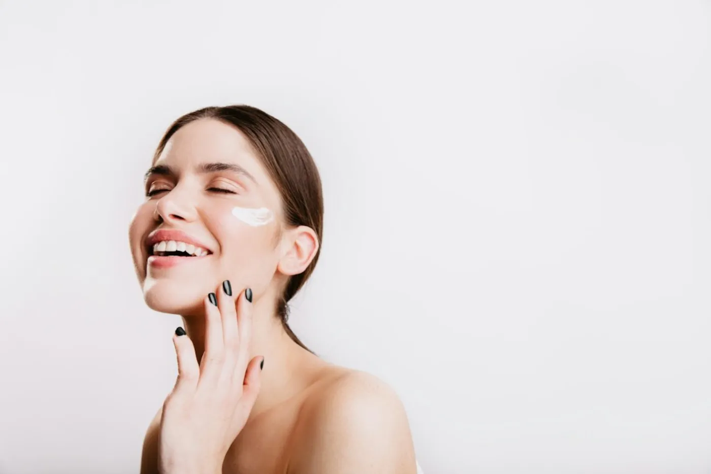 A client enjoying an intense moisture facial treatment in a salon