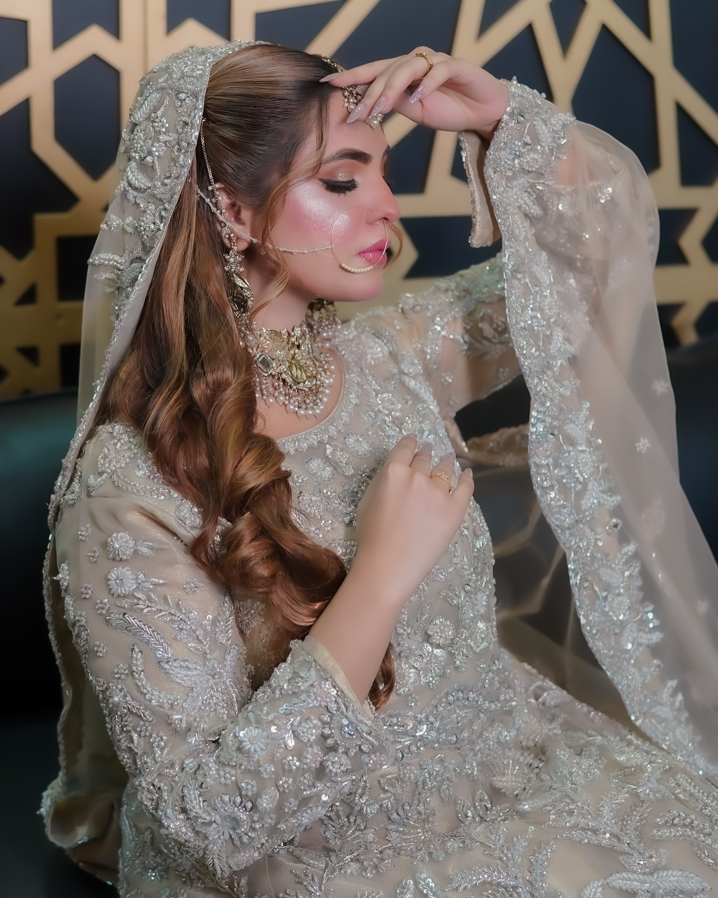 Silver bridal hair and makeup portrait against a geometric gold backdrop by House of Salons