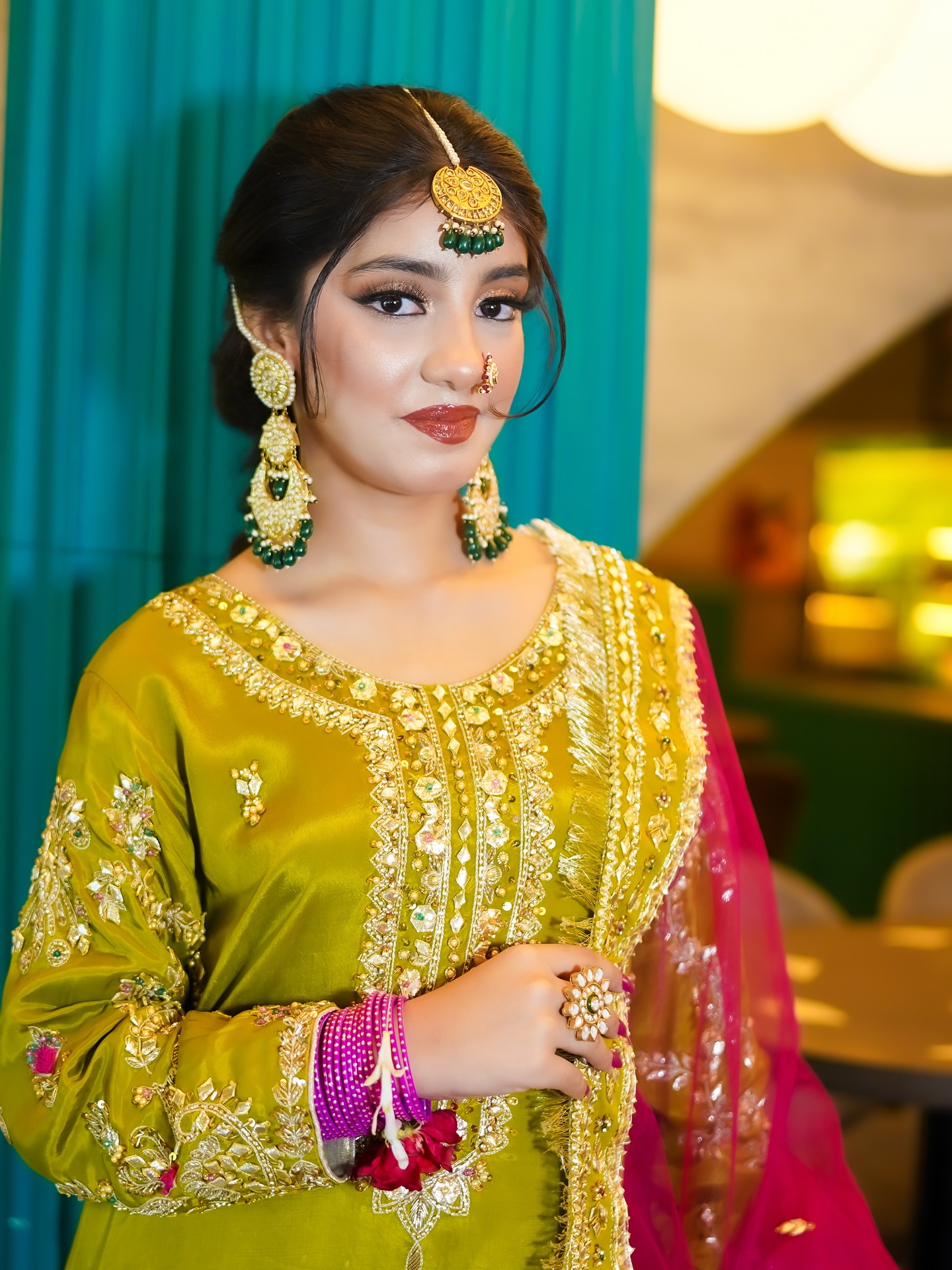 Mehndi-day makeup and hairstyling portrait by House of Salons