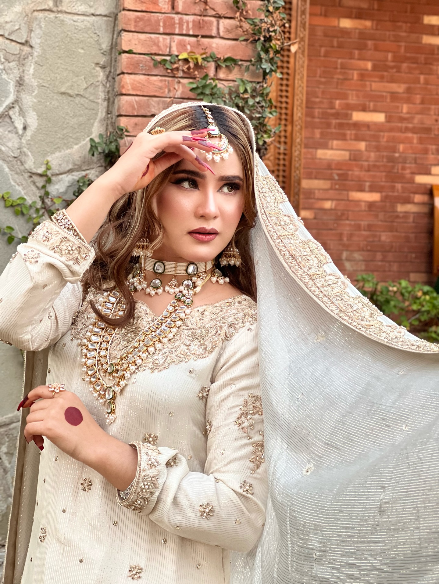 Close-up bridal makeup and jewellery portrait by House of Salons