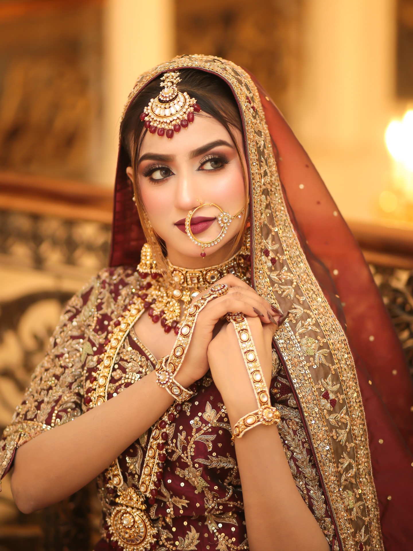 Rich bridal makeup and jewellery close-up portrait by House of Salons