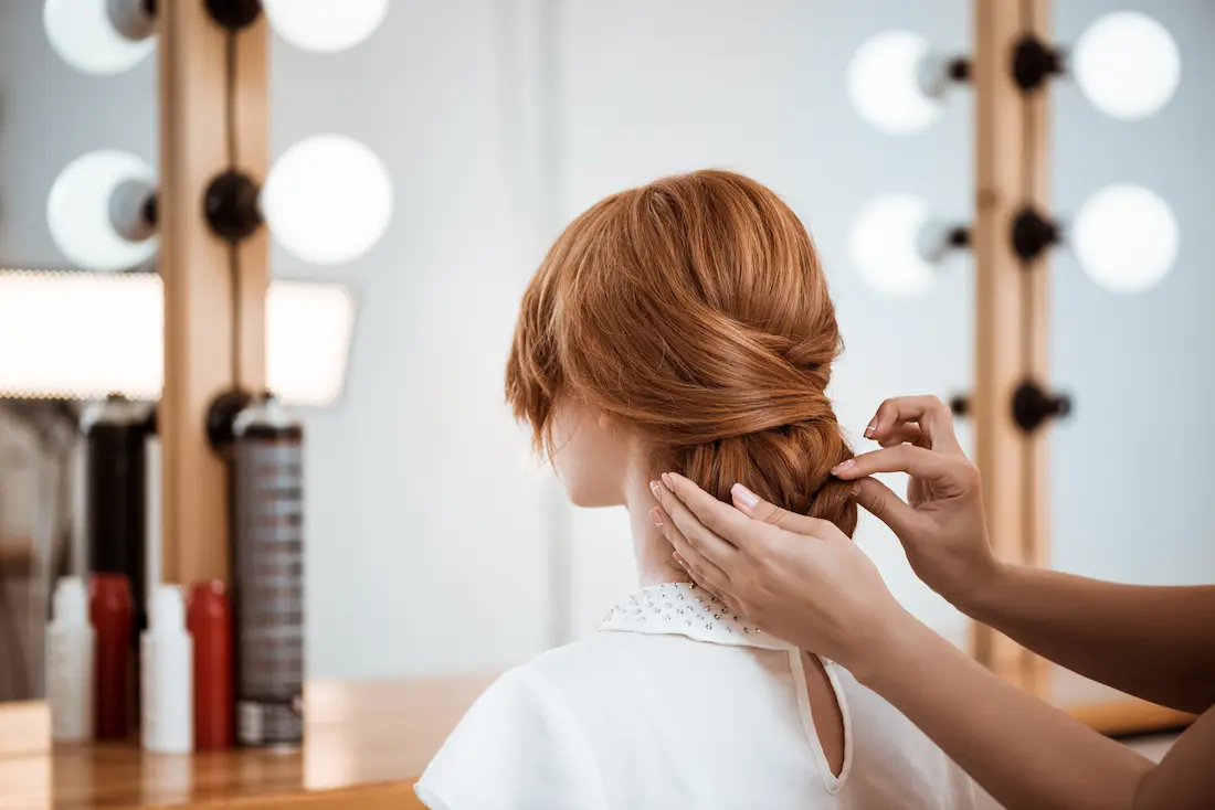 female-hairdresser-making-hairstyle-redhead-woman-beauty-salon